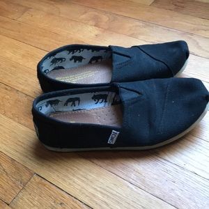 Black TOMS slip ons, GUC size 7
